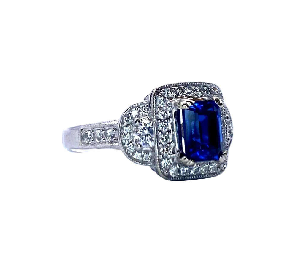 18k WG Emerald Cut Sapphire & Round Cut Diamond Ring
