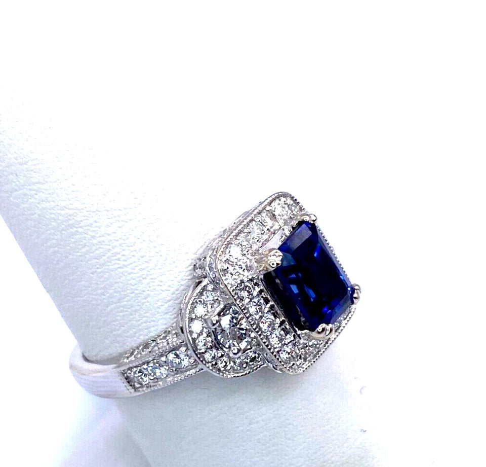 18k WG Emerald Cut Sapphire & Round Cut Diamond Ring