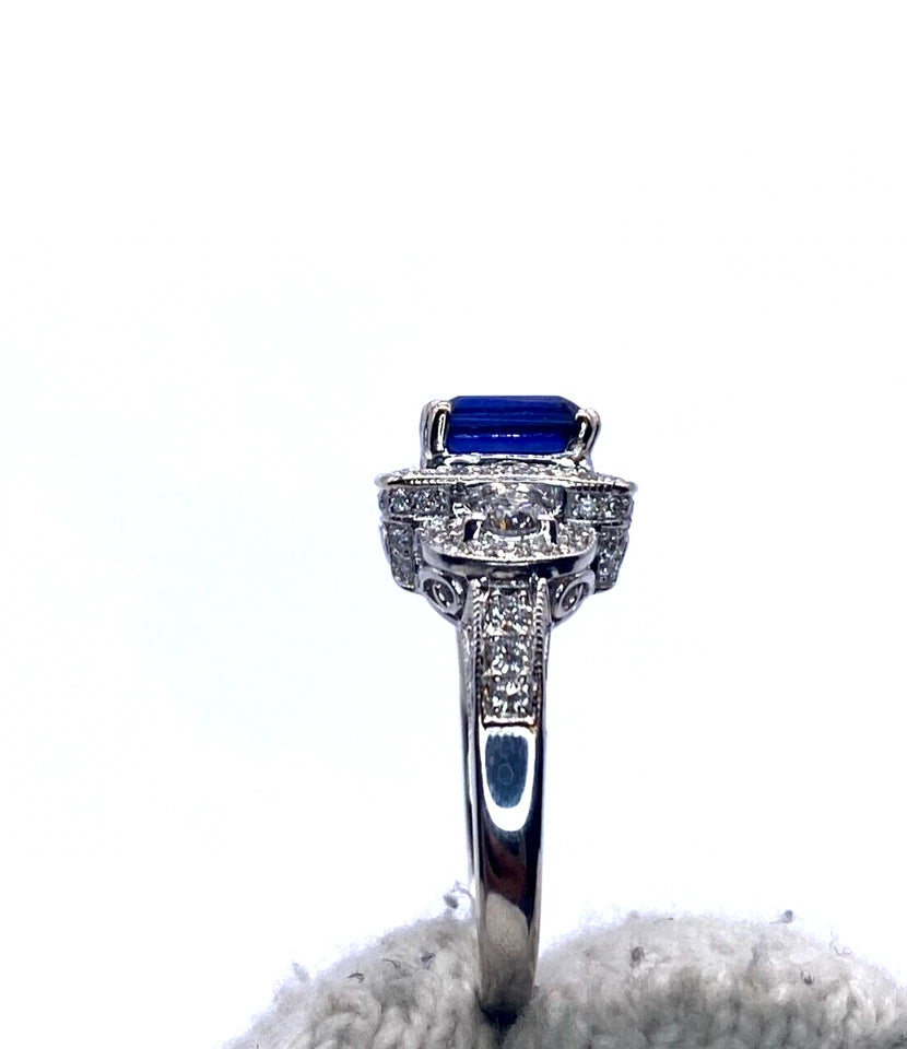 18k WG Emerald Cut Sapphire & Round Cut Diamond Ring