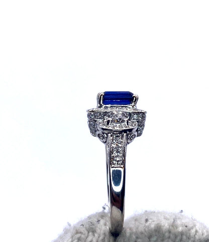 18k WG Emerald Cut Sapphire & Round Cut Diamond Ring