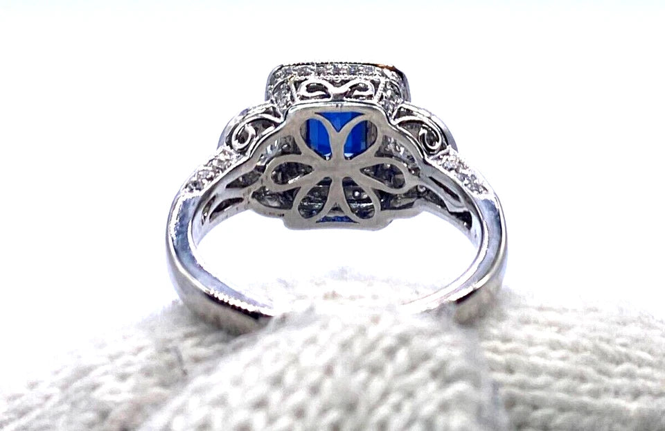 18k WG Emerald Cut Sapphire & Round Cut Diamond Ring