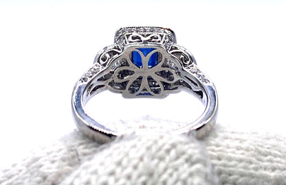 18k WG Emerald Cut Sapphire & Round Cut Diamond Ring